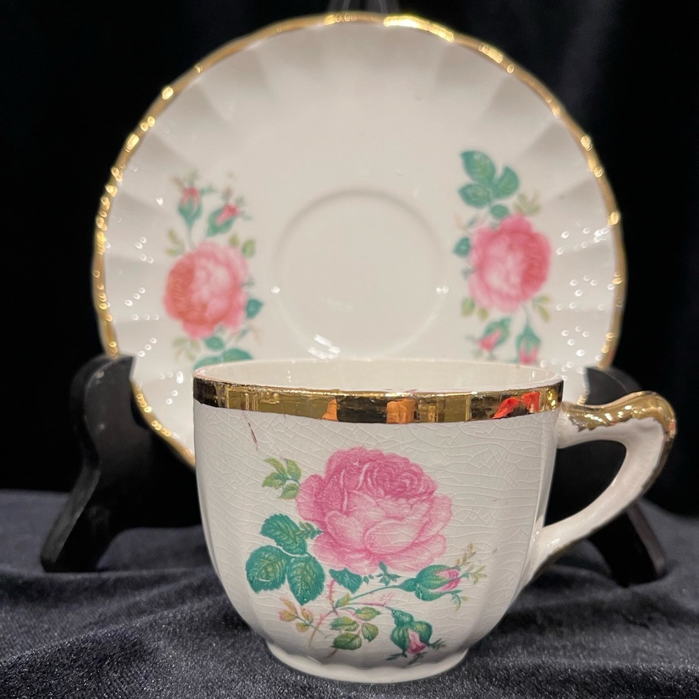 Elegant Floral Teacup and Saucer Set with 22 it Gold Trim